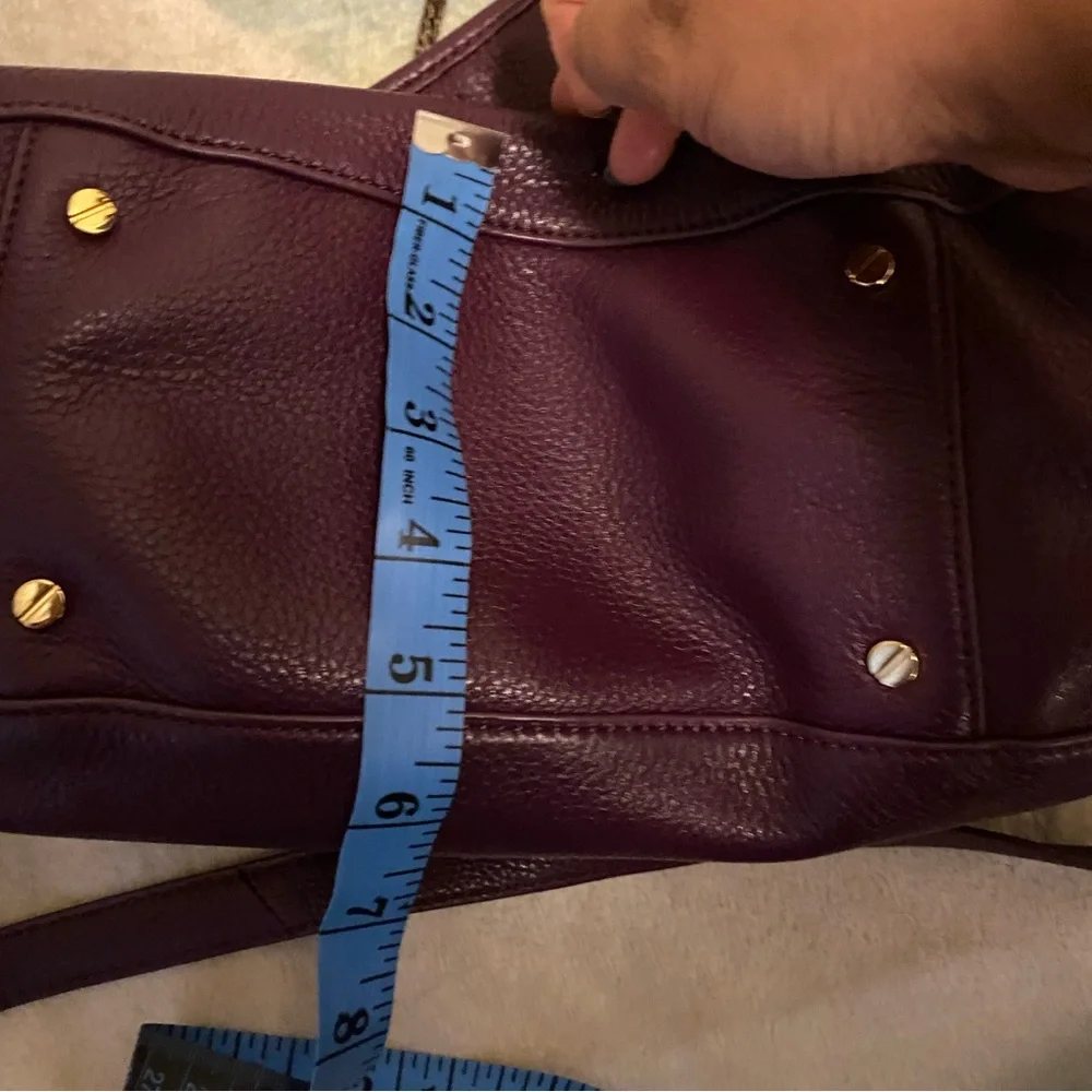 Tory Burch purple bag.